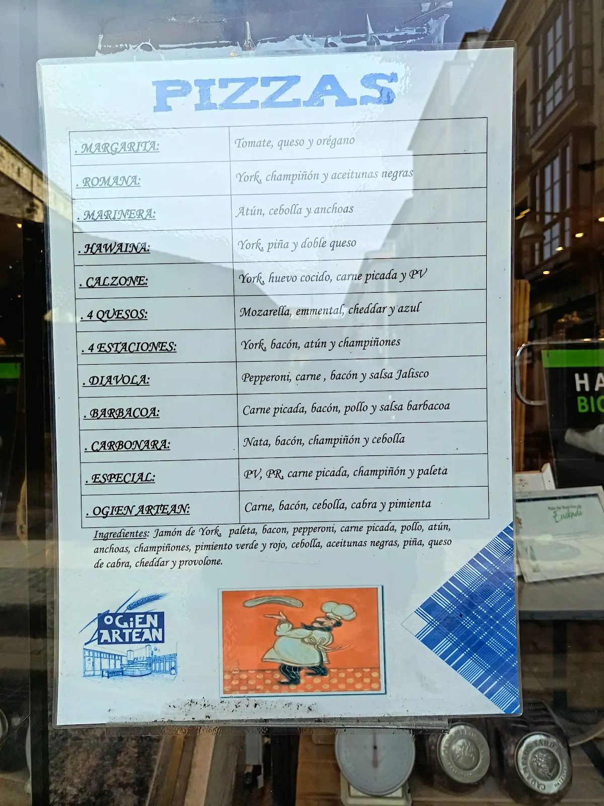 Cartel con variedades e ingredientes de las pizzas de Ogien Artean.