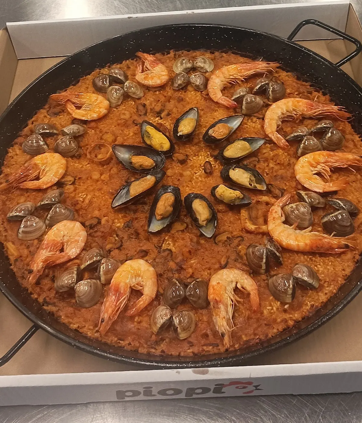 Paella con marisco de Pio Pio